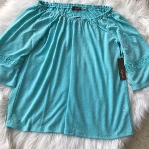 Anthro brand Crosby blue blouse unique crochet arm